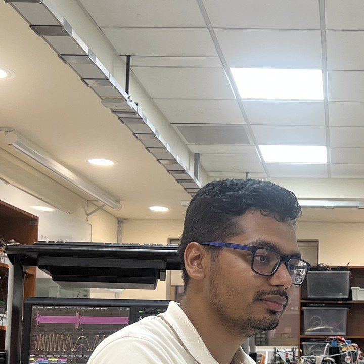 Hammad Hasan working in an electrical engineering laboratory